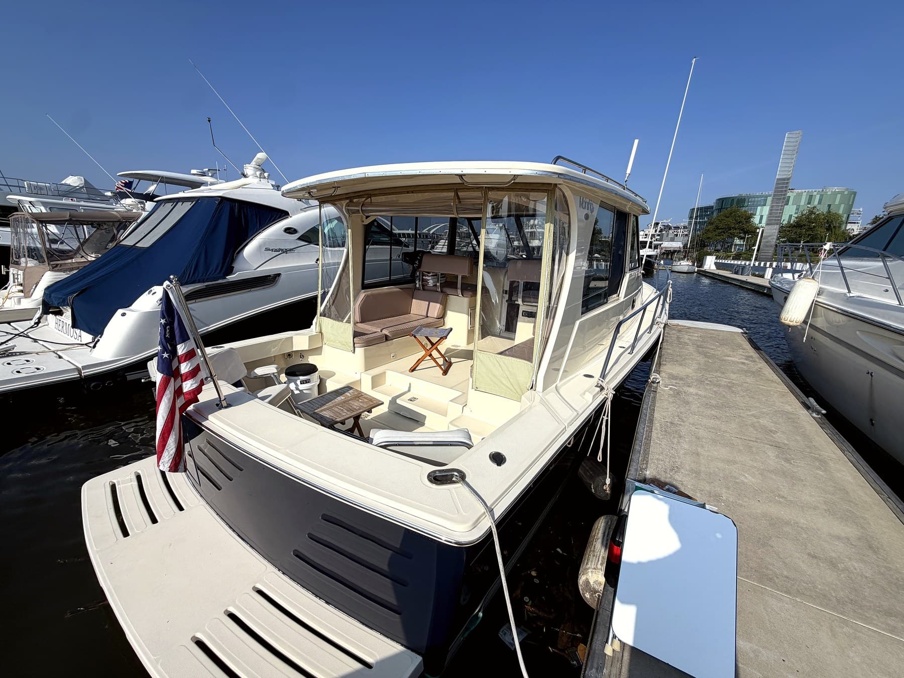 Geronimo docked at The Yards Marina at dusk, ready for a date night cruise