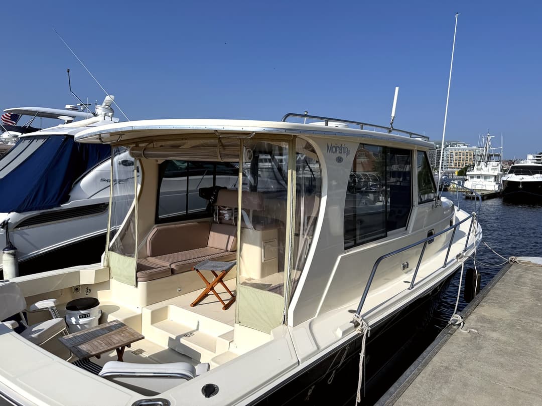 Geronimo docked, showing the open cockpit and seating