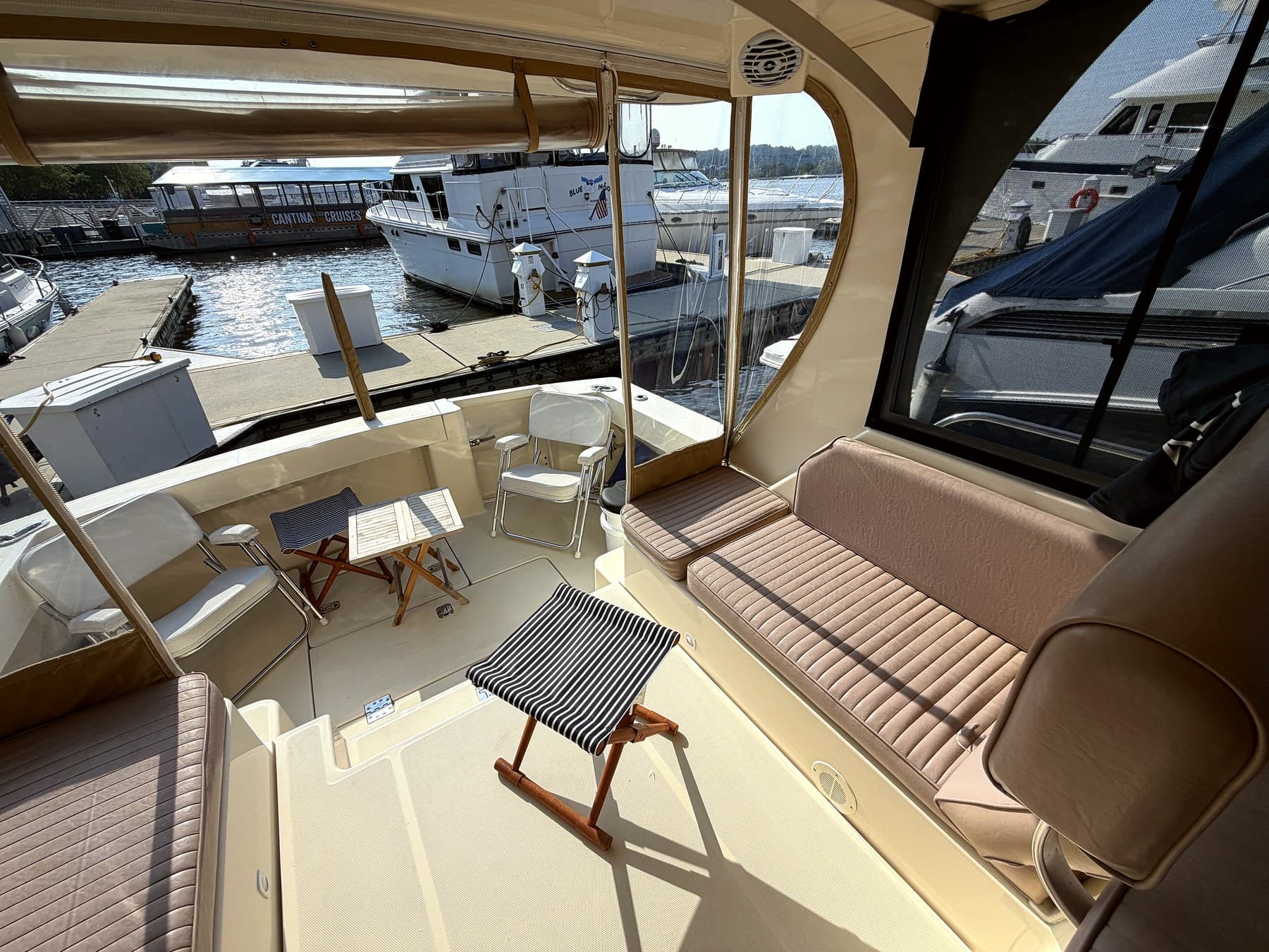 Guests enjoying the flybridge aboard Geronimo for a birthday cruise